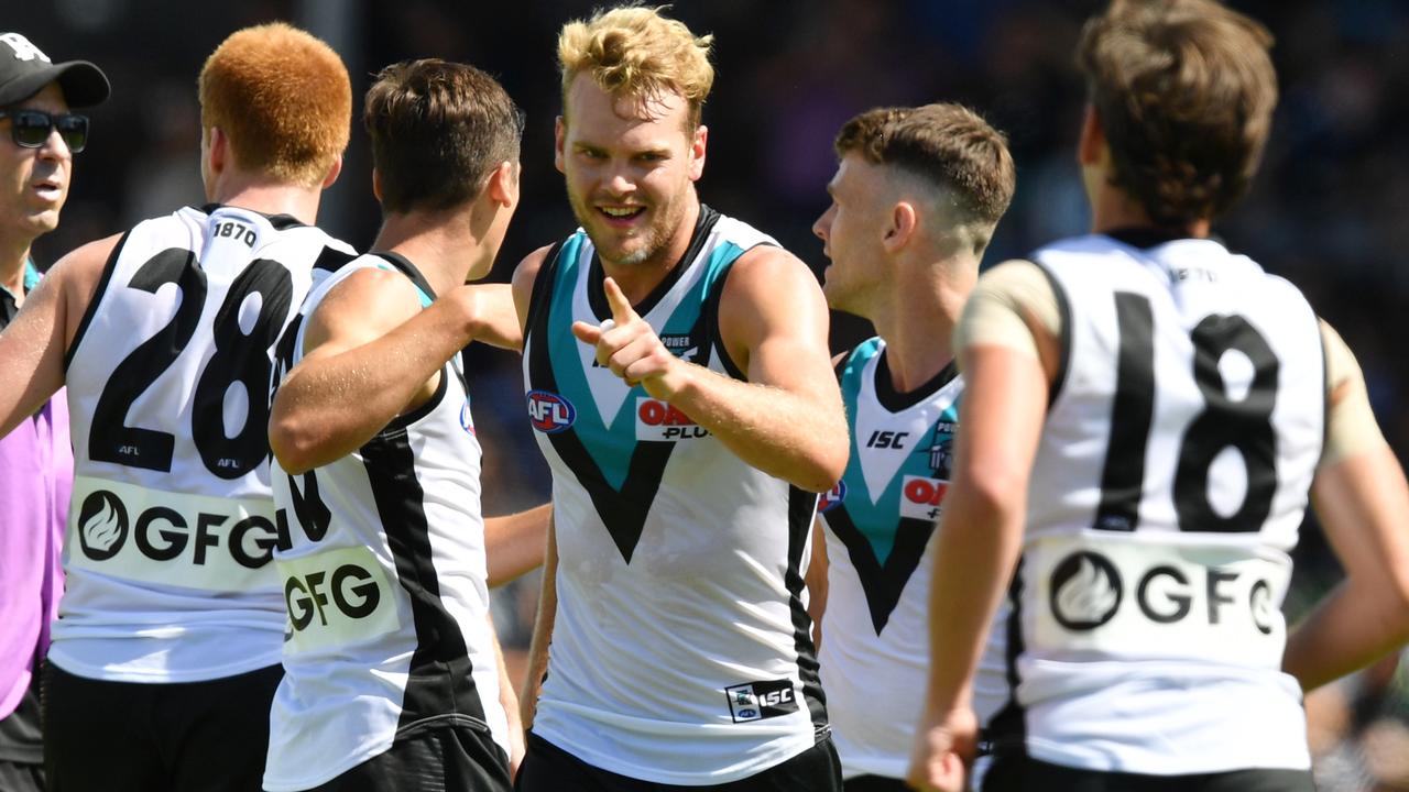 Jack Watts celebrates after kicking a last-quarter goal.