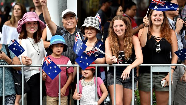 People line the streets for Australia Day Parade on Swanston St. Picture: Jay Town