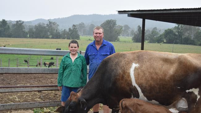 Families such as the Wheelers — Zachary and Garry Wheeler are above on their Kandanga, Queensland, dairy farm — benefitted from Woolworths’ $100m drought relief milk scheme, which the supermarket chain will switch off by the end of June.