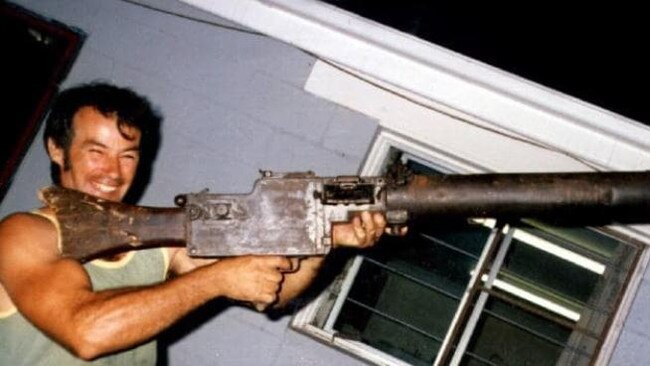 Murderer Ivan Milat in 1983, holding World War One vintage machine gun.