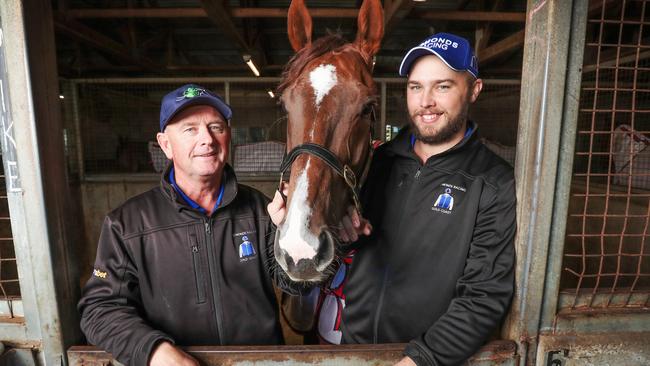 Toby and Trent Edmonds with their Group 1 Stradbroke Handicap winner Tyzone. Picture: Nigel Hallett