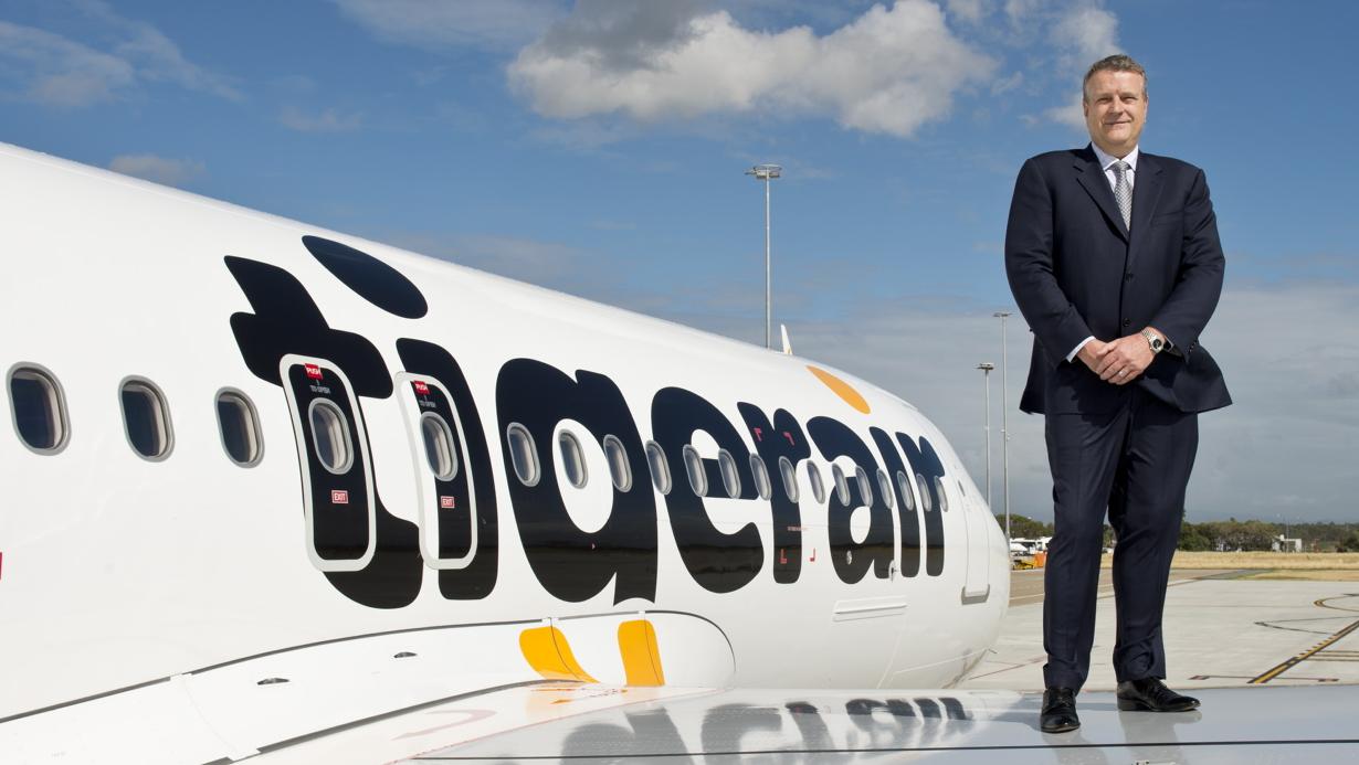 News images from TIGERAIR FREE USE FOR EDITORIAL AND ONLINE USE ONLY PLEASE CREDIT PICTURES BY JAMES MORGAN WHERE USED OR ISSUED Tigerair Australia celebrates its new Brisbane base which commences operations tomorrow (11 March 2014). Pictured: Tigerair CEO Rob Sharp (ON WING OF THE AIRBUS A320), Queensland Minister of Tourism and Major Events, the Hon Jann Stuckey and new cabin crew and pilots which will be based in Brisbane at a media event today at Brisbane Airport. Two new A320 aircraft will call Brisbane home providing 200 jobs (over 130 jobs in Brisbane), 800,000 additional domestic seats and five new routes. Picture: Morgan James