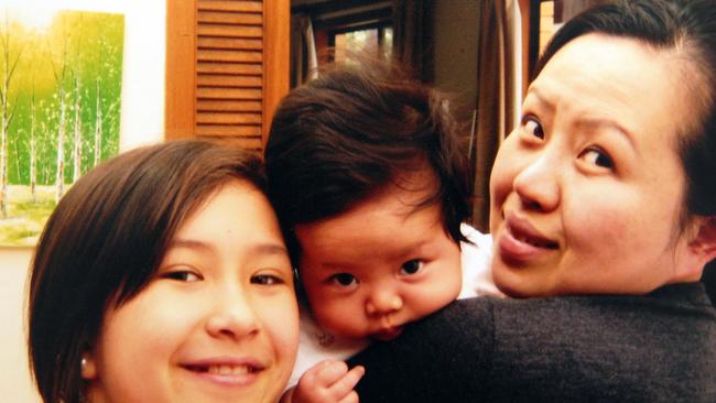 Mijin Shin, who was killed when struck by a bus in another green-on-green situation, with her daughters Kelly and Meera. 