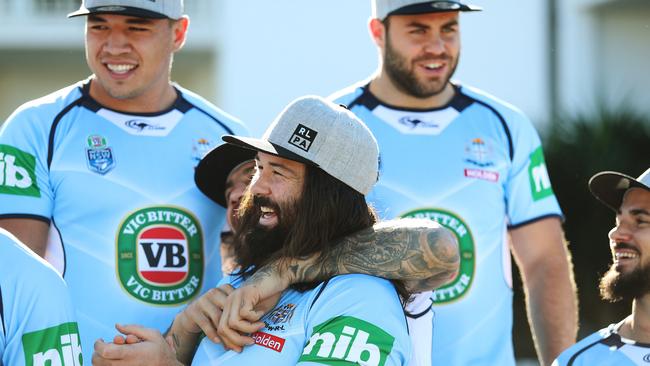 Aaron Woods and the NSW players wear the RLPA caps. Photo: Brett Costello