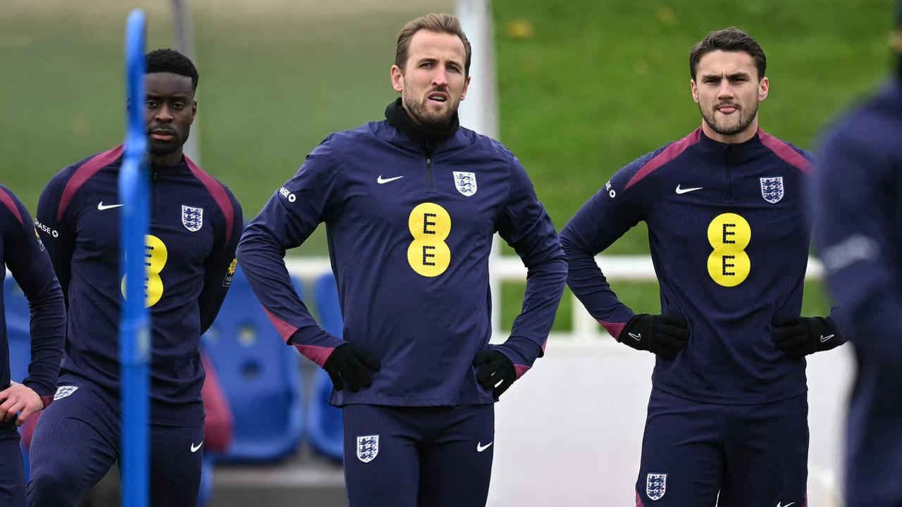 England's striker Harry Kane (C) stands with teammates during a training session at St George's Park in Burton-on-Trent, central England, on November 12, 2024 ahead of their UEFA Nations League B Group 2 football matches against Greece and Ireland. (Photo by Oli SCARFF / AFP) / NOT FOR MARKETING OR ADVERTISING USE / RESTRICTED TO EDITORIAL USE