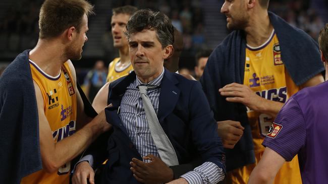 Sydney Kings coach Will Weaver led away following a fiery confrontation with match officials in Melbourne. Picture: Daniel Pockett/Getty Images