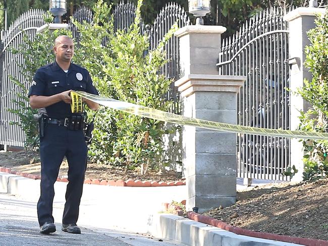 Police surround the home of singer Chris Brown in Tarzana, California. Picture: Chiva/INFphoto.com