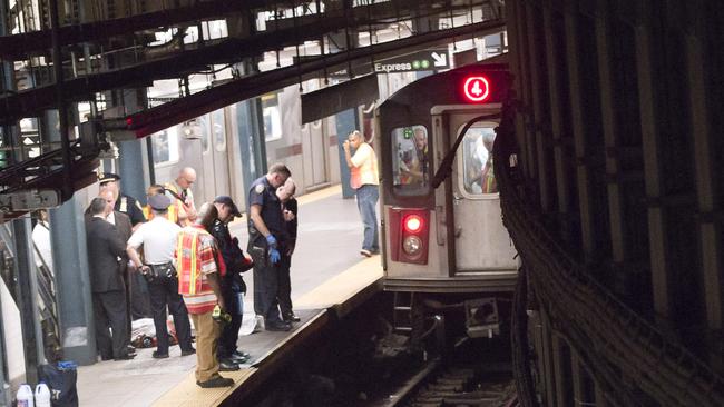 A female who fell on the express tracks of 4 and 5 trains at Union square station. By standers are saying the sliding platform malfunctioned, she lost her balance and fell on the tracks where she was run over by the train and electrocuted