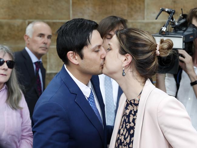 Blake Davis and Hannah Quinn share a kiss outside Darlinghurst Courthouse after Blake Davis was found guilty of manslaughter. Picture: Jonathan Ng