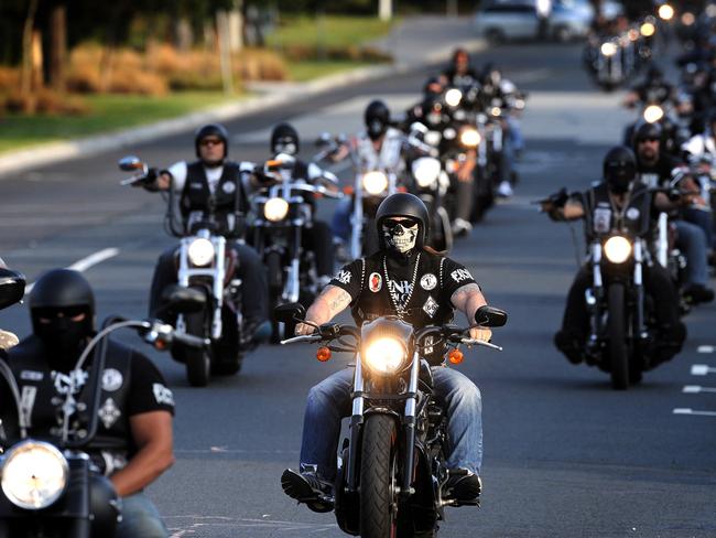 Members of the Finks motorcycle gang take off on their national run from their headquarters in Melbourne, Saturday, March 9, 2013. Five men with links to bikie gangs have been arrested in Melbourne over an alleged kidnapping conspiracy.The arrests come amid a crack down on bikie gangs through a series of raids, which police hope will prevent a potential all-out war spilling onto the city's streets. (AAP Image/Joe Castro) NO ARCHIVING