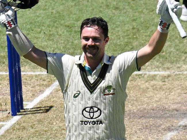 Australiaâs Travis Head (C) celebrates after scoring a century during day two of the first cricket Test match between Australia and the West Indies at the Adelaide Oval in Adelaide on January 18, 2024. (Photo by Izhar KHAN / AFP) / -- IMAGE RESTRICTED TO EDITORIAL USE - STRICTLY NO COMMERCIAL USE --