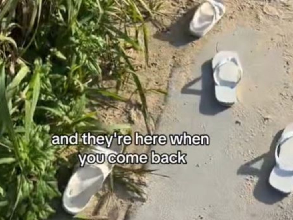 Beach pic proves quirky Aussie summer pact: Don't take the thongs!