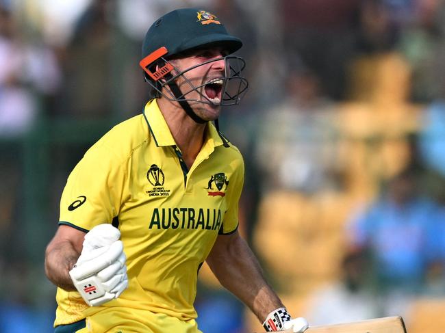 TOPSHOT - Australia's Mitchell Marsh celebrates after scoring a century (100 runs) during the 2023 ICC Men's Cricket World Cup one-day international (ODI) match between Australia and Pakistan at the M. Chinnaswamy Stadium in Bengaluru on October 20, 2023. (Photo by R.Satish BABU / AFP) / -- IMAGE RESTRICTED TO EDITORIAL USE - STRICTLY NO COMMERCIAL USE --