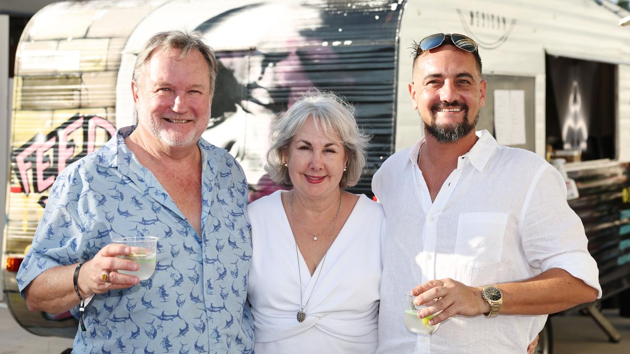 Glenn Bedwell, Frances Bedwell and Christian Bedwell celebrate the grand opening of boutique gin distillery Distil on the Hill's new Smithfield distillery. Picture: Brendan Radke