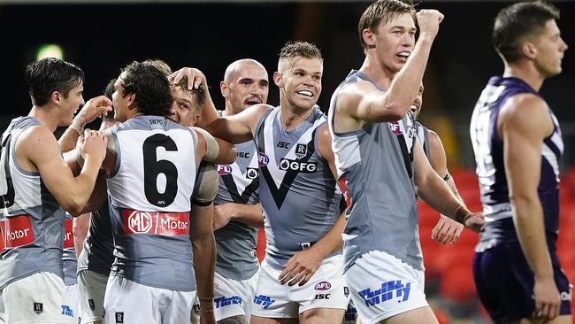 Ollie Wines (centre) returned to the side with a bang on the weekend. Picture: Dave Hunt (AAP).