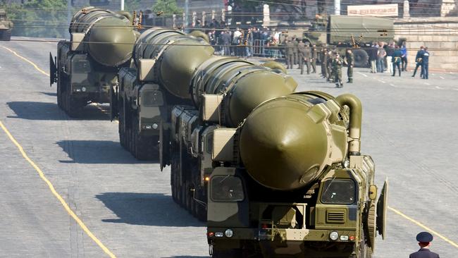 A convoy of nuclear missiles in a military parade on Red Square, Moscow.