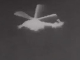 Ukraine government releases footage reported to show the shooting down a Russian helicopter by one of their drones. ,