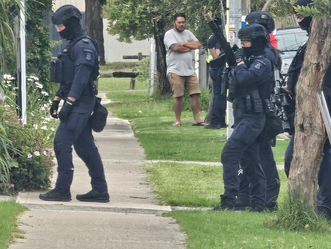 01/12/2024 Police and Paramedics outside a home on Tadstan drive Tullamarine where a man is refusing to leave his home. , Uniformed and plain clothed police could be seen on site, as well as paramedics and Fire Rescue Victoria., picture:  Jordan McCarthy