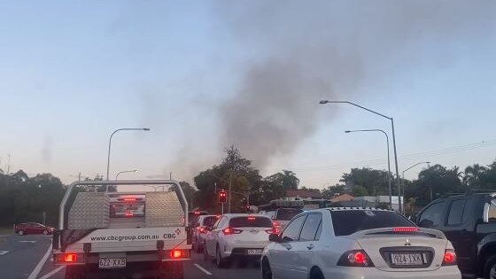 Smoke seen coming from the Carrara grass fire on Tuesday. Picture: Dean Shelton