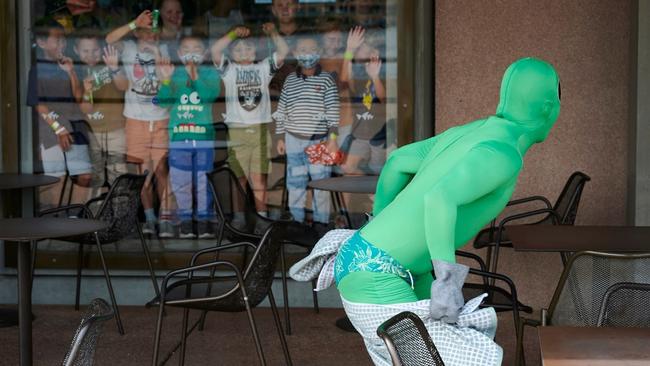 Meet an alien at Sydney Opera House.