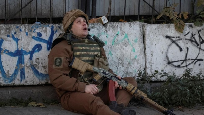 A Ukrainian soldier in Kyiv as an air raid siren sounds. Picture: Gleb Garanich/Reuters/The Times