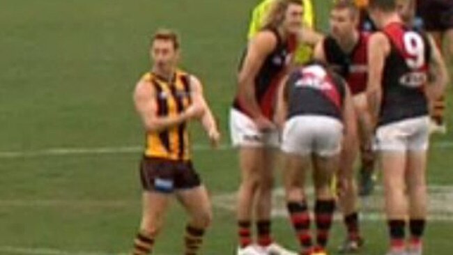 Sam Mitchell taunts Essendon players by motioning to inject himself with a needle. Picture: Fox Sports