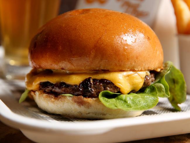 Wrap your laughing gear around this Leonard’s House of Love cheeseburger. Picture: Nicole Cleary