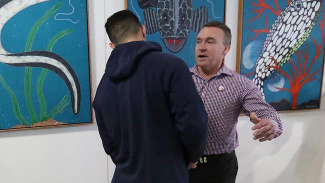 Broncos CEO Paul White greets David Fifita on his arrival back in Brisbane. Photographer: Liam Kidston.