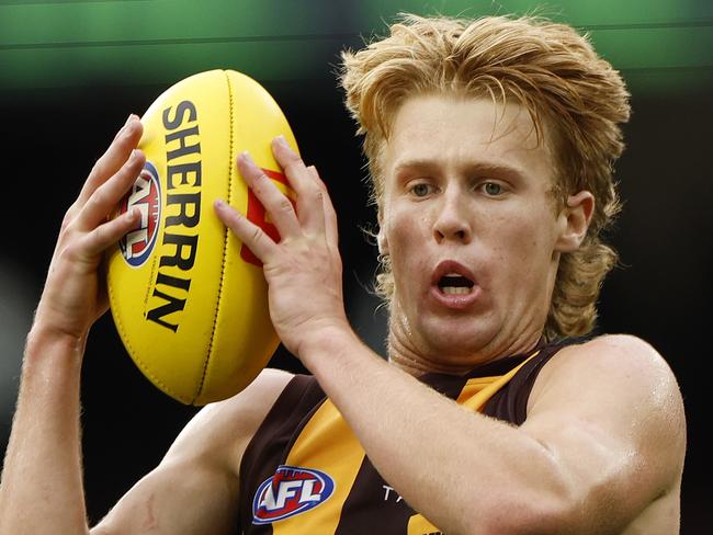 MELBOURNE, AUSTRALIA - MARCH 19: Cam Mackenzie of the Hawks in action during the round one AFL match between Hawthorn Hawks and Essendon Bombers at Melbourne Cricket Ground, on March 19, 2023, in Melbourne, Australia. (Photo by Jonathan DiMaggio/AFL Photos/via Getty Images)