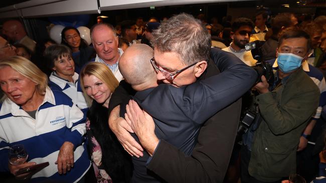 Josh Frydenberg mobbed by supporters including Ted Baillieu, at the Grace Park Hawthorn Club. Picture: David Caird