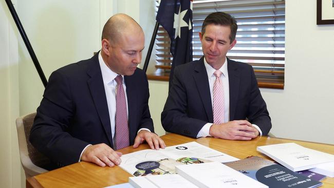 Treasurer Josh Frydenberg and Finance Minister Simon Birmingham with the 2021 budget papers. Picture: Getty Images