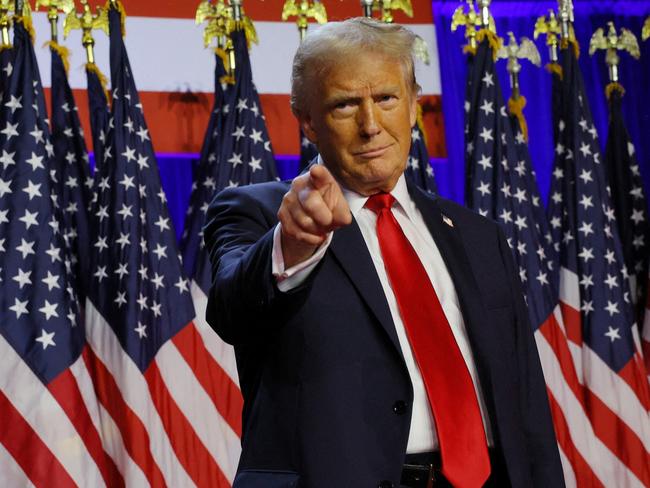 Republican presidential nominee and former U.S. President Donald Trump takes the stage to address supporters at his rally, at the Palm Beach County Convention Center in West Palm Beach, Florida, U.S., November 6, 2024. REUTERS/Brian Snyder     TPX IMAGES OF THE DAY