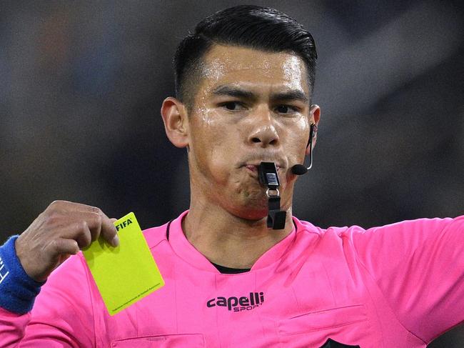 SAN DIEGO, CALIFORNIA - MAY 17: Referee Victor Rivas issues a yellow card during the first half of the game between the San Diego FC and the Sporting Kansas City at Snapdragon Stadium on May 17, 2025 in San Diego, California. (Photo by Orlando Ramirez/Getty Images)