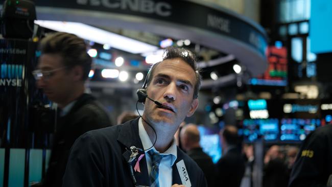 Traders work on the floor of the New York Stock Exchange. Picture: AFP