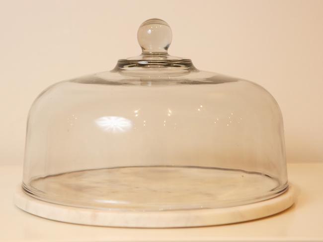 Glass cloche dome: I love having friends over and entertaining. I’ll put together cheeses, cured meats, breadsticks and be sure they’re ready and covered before they get here.