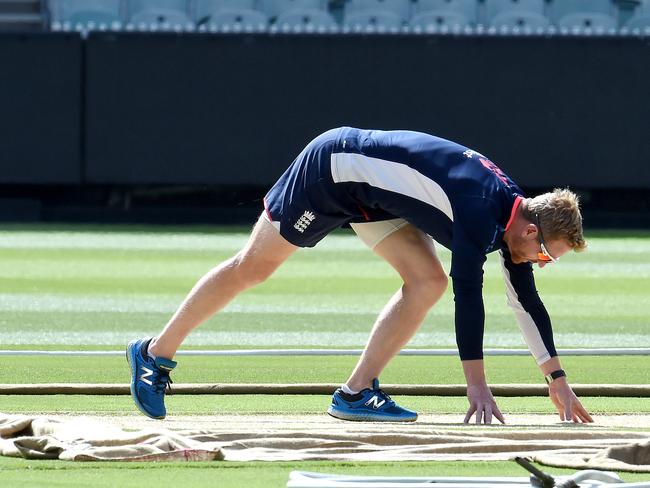 England fielding coach Paul Collingwood inspects the MCG deck. Picture: Nicole Garmston