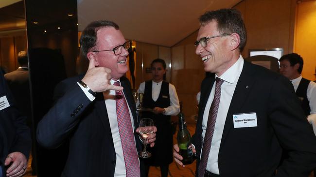 Can I call you? Woodside CEO Peter Coleman and BHP boss Andrew Mackenzie at the Business Council of Australia Annual Dinner in Sydney. Picture: John Feder