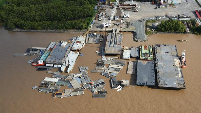 Debris, pontoons and boats were strewn about the Brisbane River and Moreton Bay.