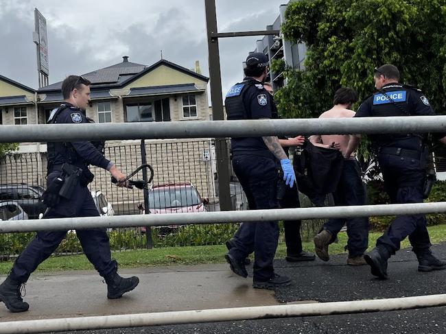 Police have taken a man into custody after he allegedly fled from the scene of a roadside breath testing operation.