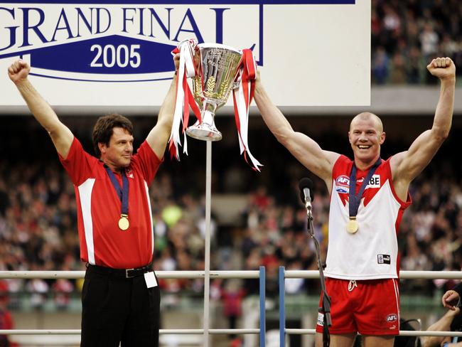 2005 Grand Final. Sydney Swans v West Coast Eagles. MCG. Coach Paul Roos and Barry Hall raise the cup.