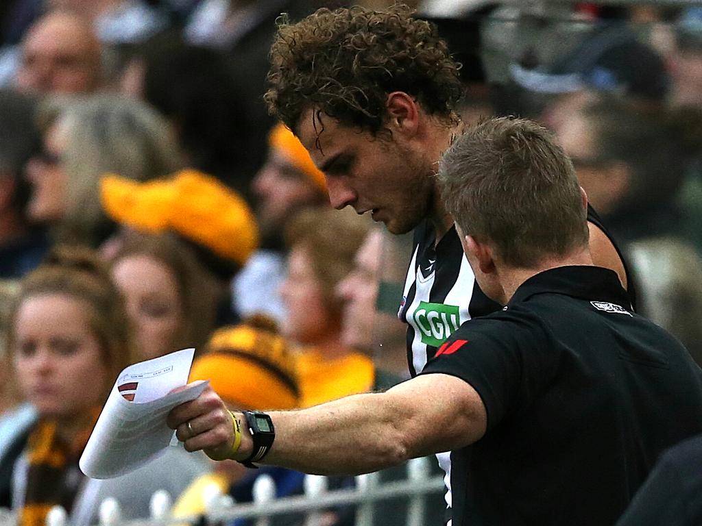Collingwood coach Nathan Buckley and Witts had an awkward confrontation caught on camera during a game against Hawthorn. Picture: News Corp Australia