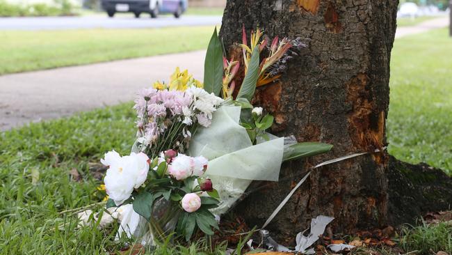 Bradley Smith was declared dead on February 14 this year. Floral tributes at the scene of the crash lay amongst broken car pieces and tree bark. Picture: Brendan Radke