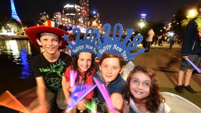 Young revellers enjoying New Year’s Eve on the Yarra. Picture: Jay Town