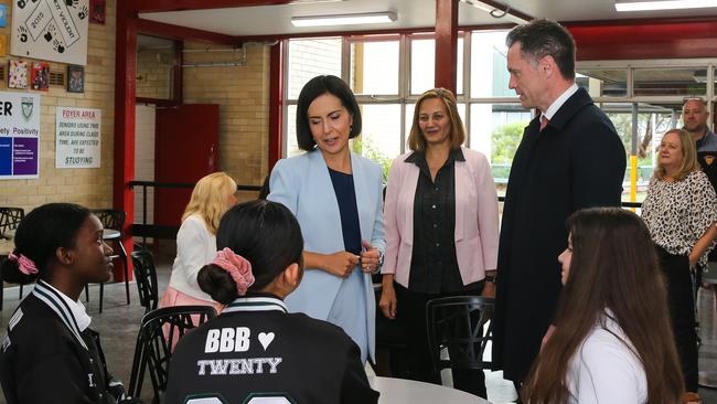 NSW Premier Chris Minns (right) and Deputy Premier Prue Car (left) meet students at Condell Park High School and Ms Mobayed (centre). Picture: Gaye Gerard