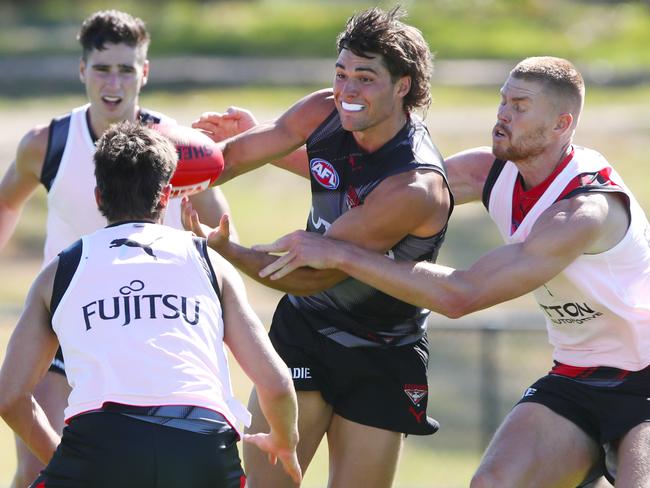 Sam Durham dishes a handball. Picture: David Crosling