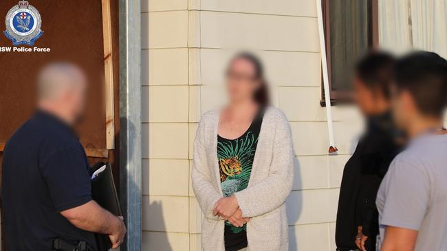 Nicole Crawford during her arrest at Swansea. Picture: NSW Police.