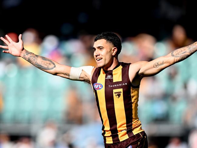 LAUNCESTON, AUSTRALIA - APRIL 01: Tyler Brockman of the Hawks celebrates a goal  during the round three AFL match between Hawthorn Hawks and North Melbourne Kangaroos at University of Tasmania Stadium, on April 01, 2023, in Launceston, Australia. (Photo by Steve Bell/Getty Images)