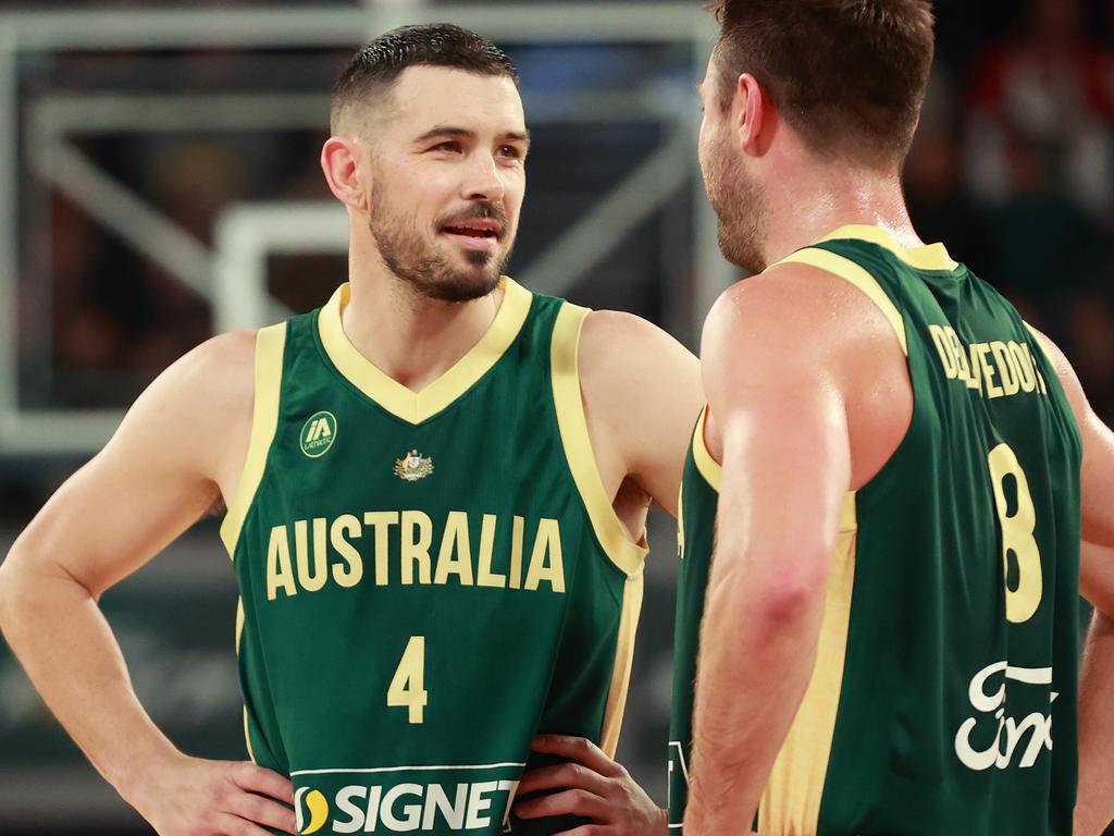 Chris Goulding reacts with Boomers teammate Matthew Dellavedova. Picture: Getty Images