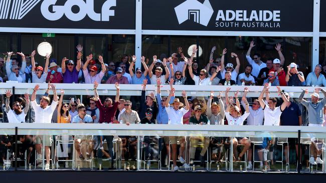 ADELAIDE, AUSTRALIA - NewsWire Photos 21, April, 2023: Members of the Crowd party at the 12th hole at the Livi Golf tournament at the Grand golf course, Adelaide.  Picture: NCA NewsWire / Kelly Barnes