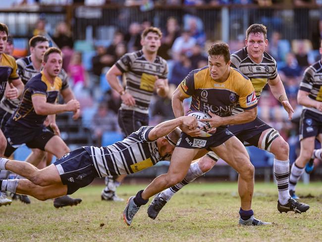 Bond University centre Corbin Kiernan on the run against Brothers. Picture: Stephen Tremain